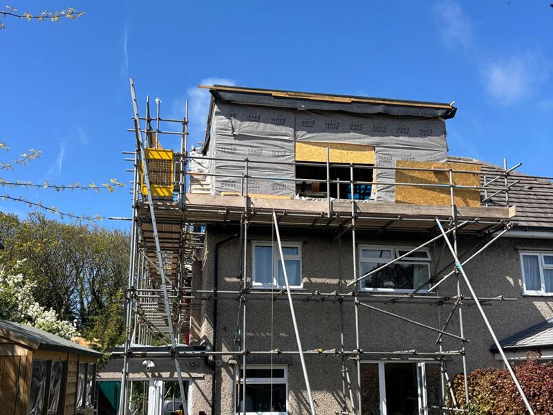 New dormer weathered in with breather membrane and board sheathing, seen from the rear garden